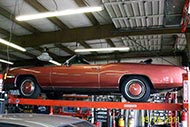 auto-shop-tour-customers-cars-cadillac